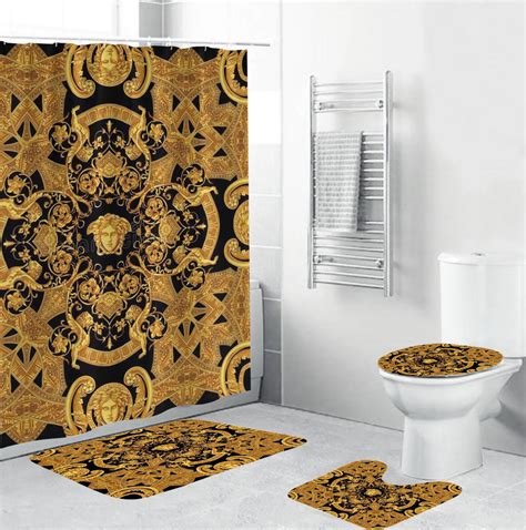 gold versace bathroom set|Versace hand towels.